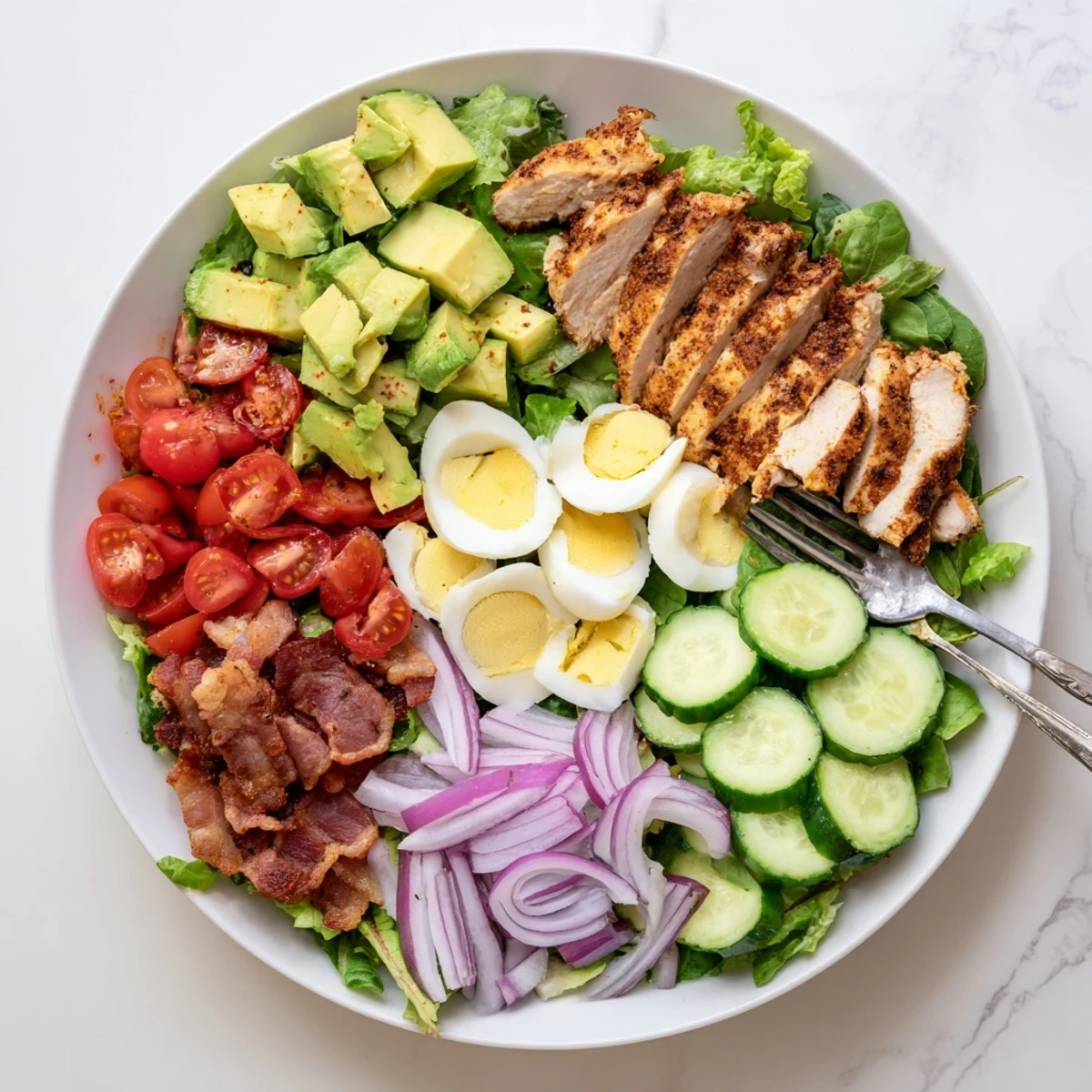 Wholesome Paleo Grilled Chicken Cobb Salad arranged beautifully with mixed greens and cherry tomatoes