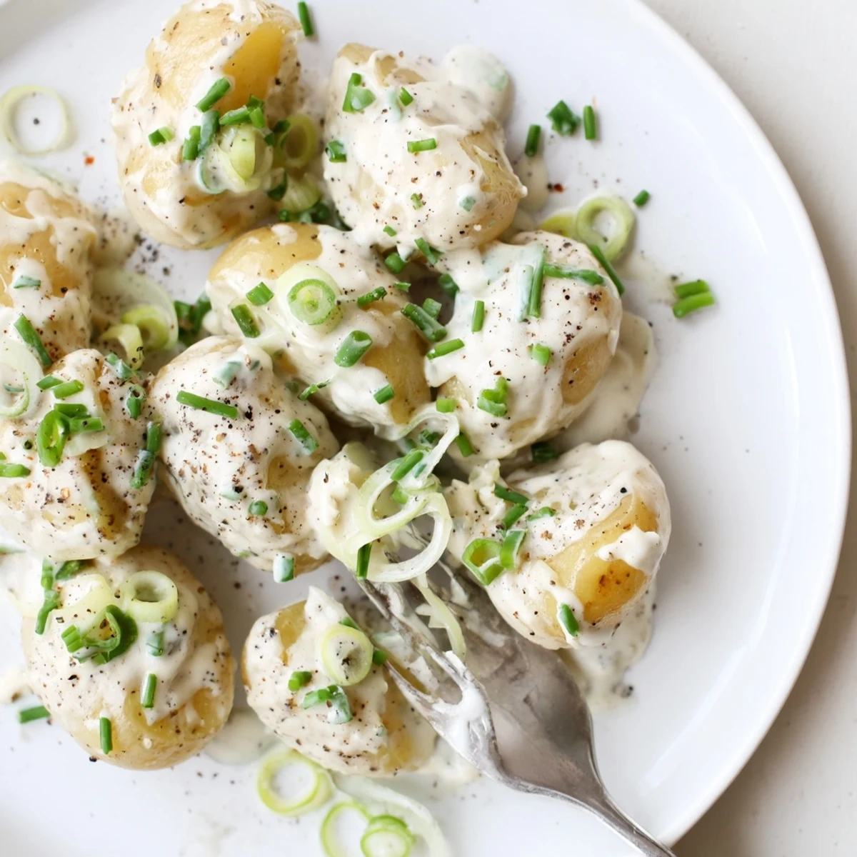 Satisfying Sour Cream And Onion Potato Salad served chilled, perfect with grilled meats