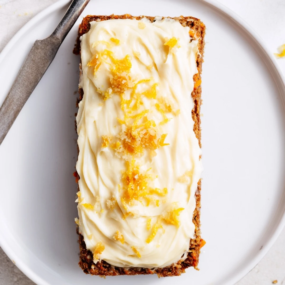 Warm, zesty Spiced Ginger Carrot And Zucchini Bars With Lemon Cream Cheese Frosting