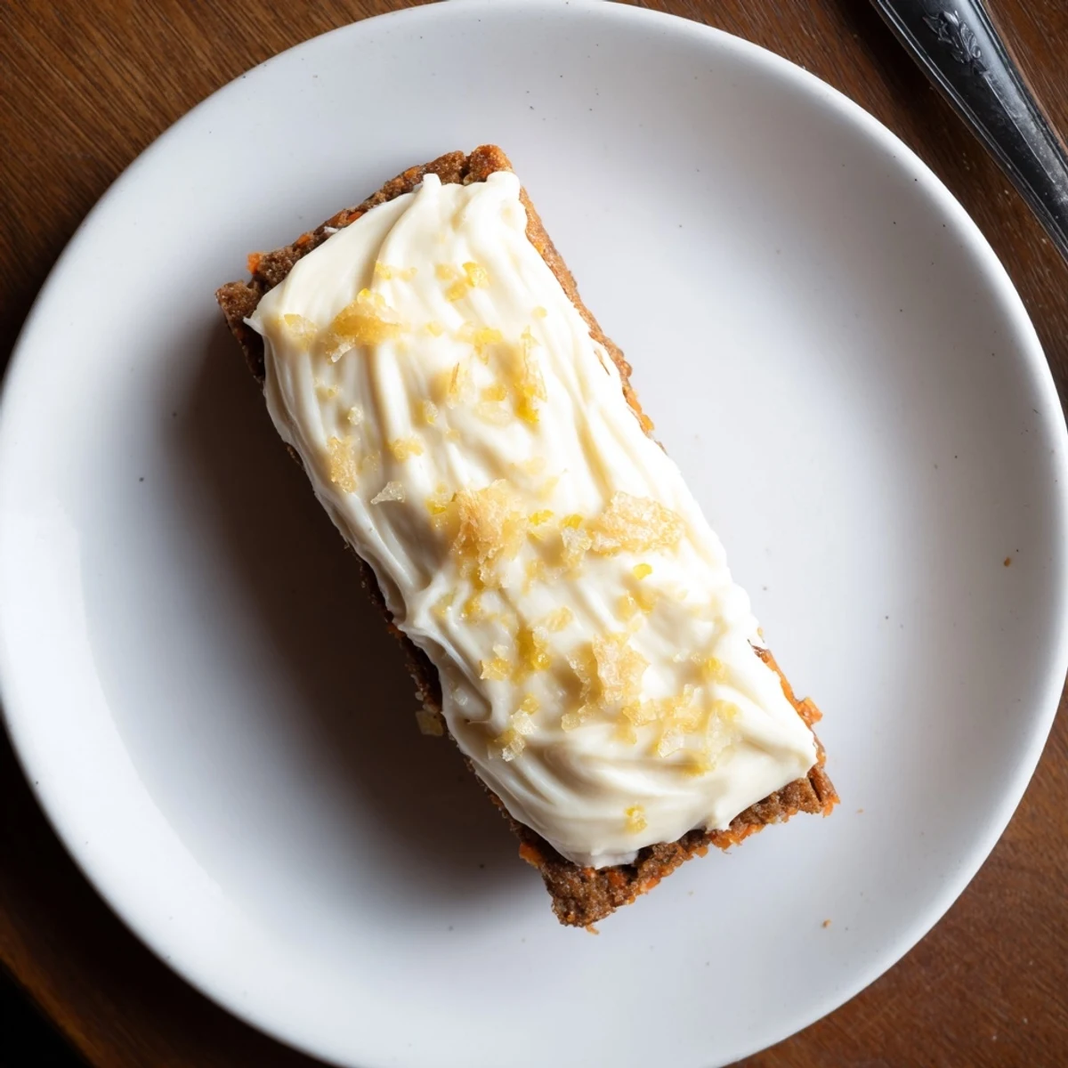 Spiced Ginger Carrot And Zucchini Bars With Lemon Cream Cheese Frosting sliced into squares