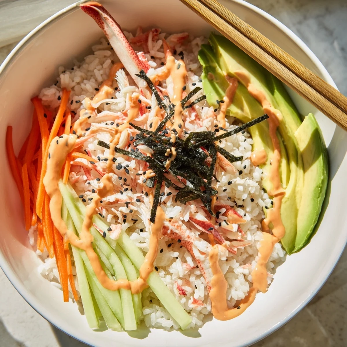 Deconstructed California Roll Sushi Bowls: warm seasoned rice, crisp cucumber, pickled ginger