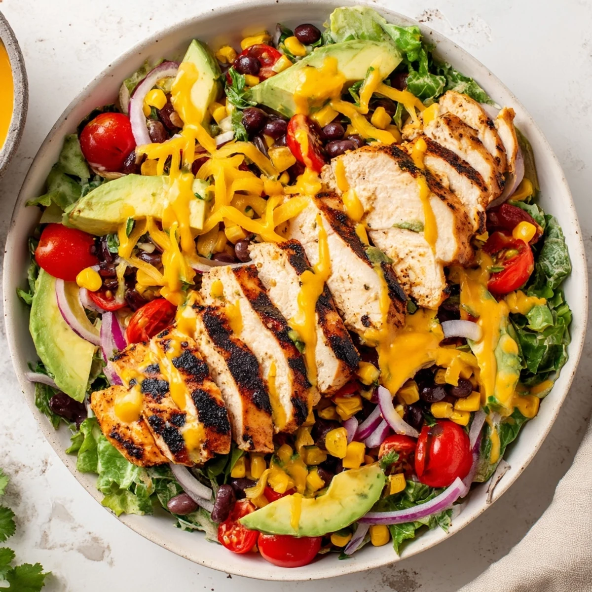 Grilled chicken crowns a Southwestern Chicken Salad dressed in tangy lime yogurt.