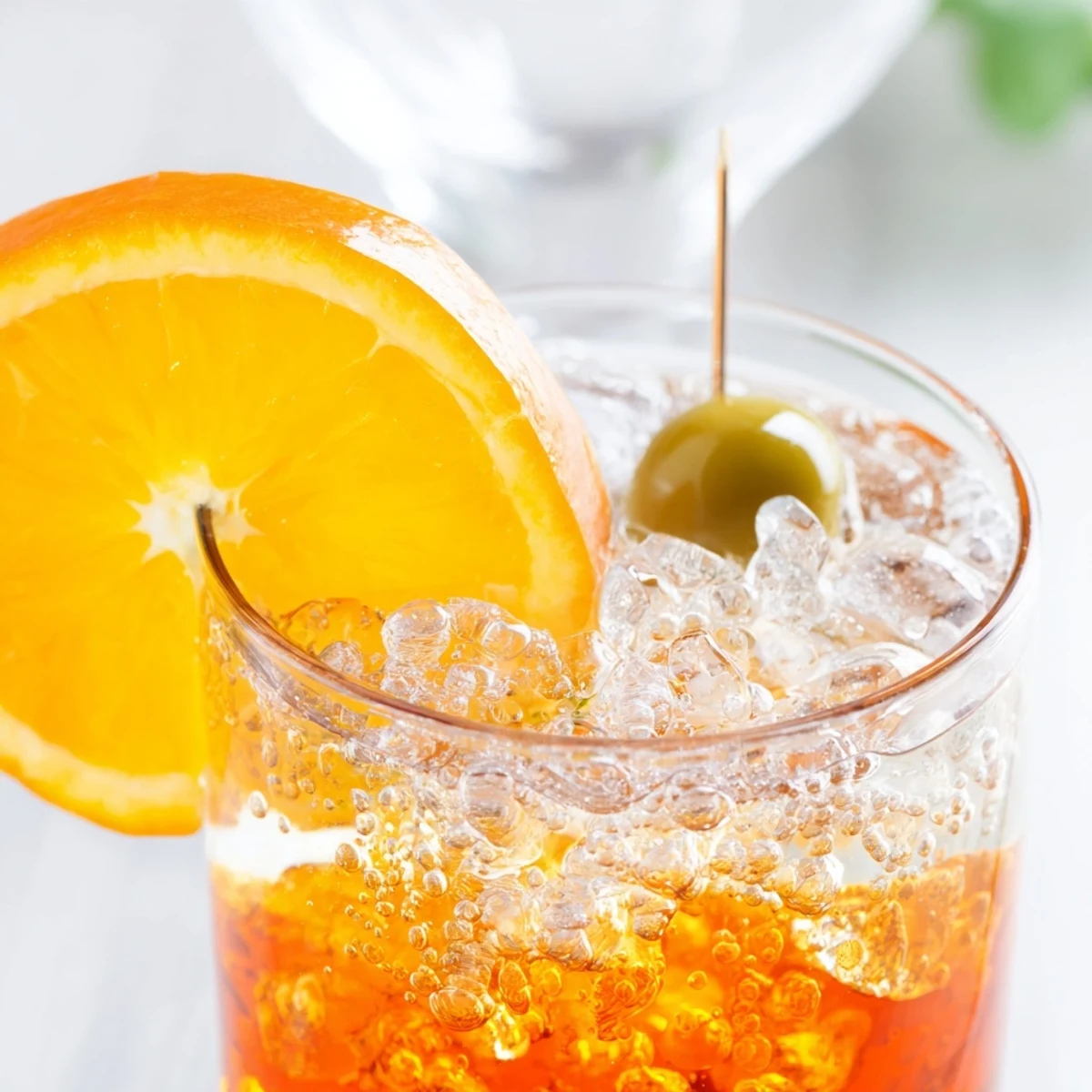 Refreshing Spritz recipe showcasing Prosecco, Aperol, and soda water in a wine glass.  
